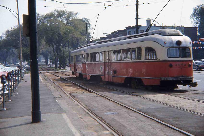 Photo of Two car trolley train heads out onto Beacon St. PCC 3082 MU'ing. 9_1968