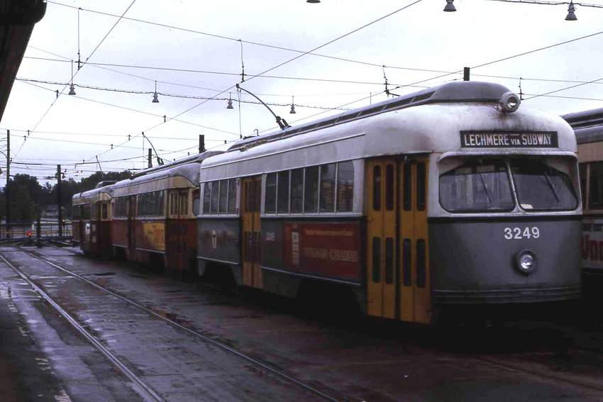 Photo of PCC 3249 Gray&Yellow paint @ Riverside ready to lead 3 car train to Lechmere via
