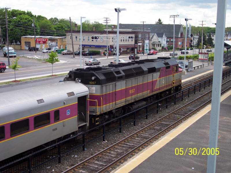 Photo of MBTA engine 1067 pushes train 558 out of Framingham.