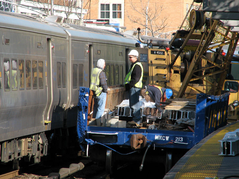 Photo of M-7 MU's Passing M-O-W Crew At Fordham Station