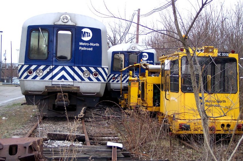 Photo of a couple MUs wait to be scrapped.
