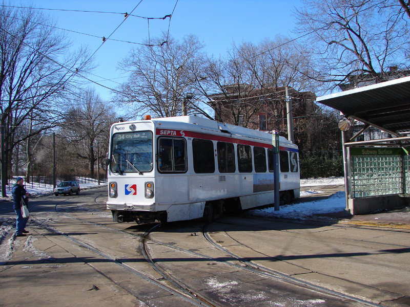 Photo of SEPTA Kawasaki Trolley going around the loop in front of the 40th Street Portal