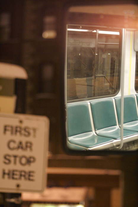 Photo of Empty Seats reflected in a door mirror of a Type 8 @ Brigham Circle.