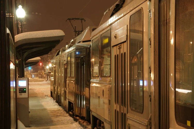 Photo of Two Type 8s wait their turn to head inbound from Brigham Circle on the MBTA E ln