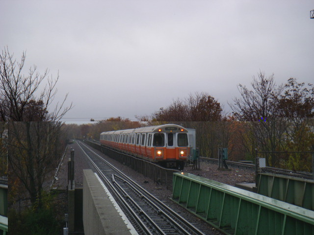 Photo of MBTA Orange Line Train Approaches Malden Center Station