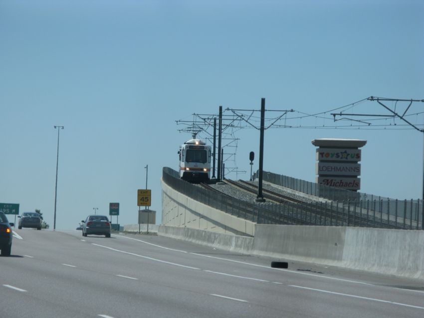 Photo of Denver RTD train runs in the highway median