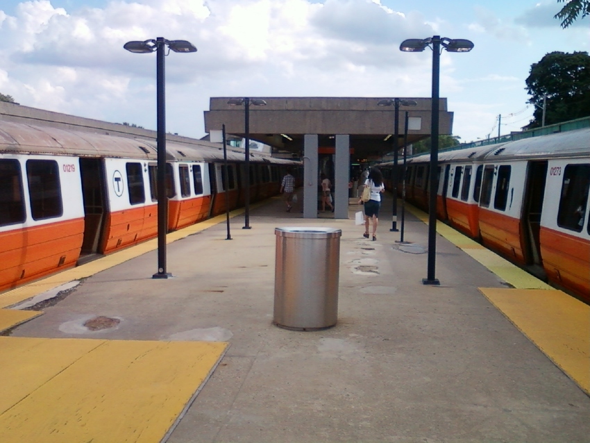 Photo of 2 Orange Line trains parked at Oak Grove station
